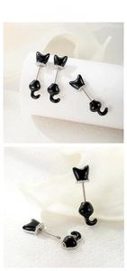 Detail of black kitten cartilage earring showing screw back closure and cat charm