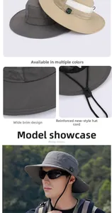 Detail of outdoor sun hat with wide brim, adjustable drawstring and compass accent