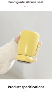 Detail of yellow portable mug featuring food-grade silicone seal and matching carry strap