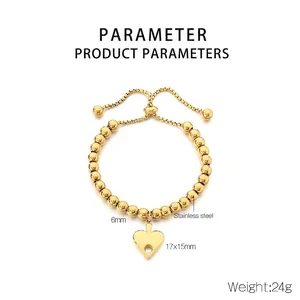 Detail of 18K gold plated heart pendant with 6mm steel beads and size parameters