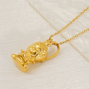 Gold Sun Wukong pendant necklace with minimalist chain in 45-degree macro view