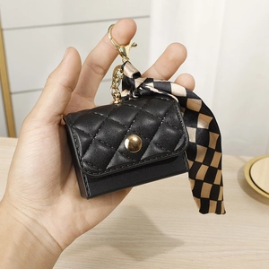 Black quilted mini coin purse and lipstick case with checkered silk scarf and keychain