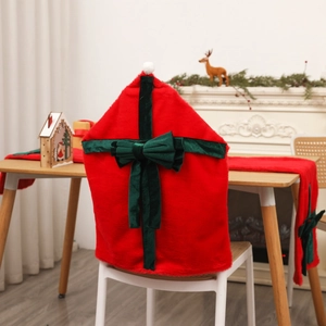 Plush Christmas chair cover and table runner set with festive red velvet bows