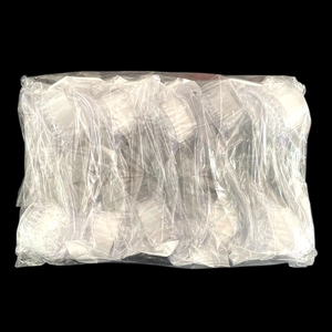 Bulk packaging of round head nail cleaning brushes with white bristles and clear handles