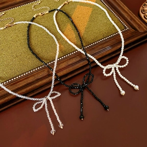French style bow necklaces with pearl and crystal beads in white, black and clear
