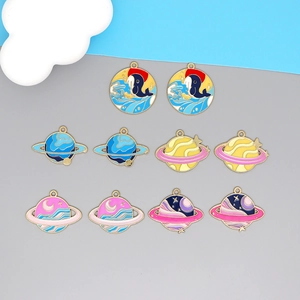 Blue dolphin and colorful asteroid planet enamel pendants with gold metal frames