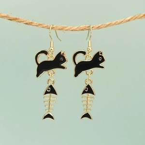 Creative black cat and fish bone dangle earrings in gold finish on rustic rope
