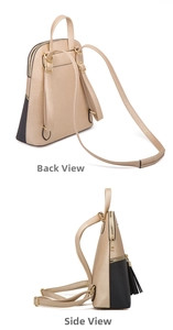 Detail view of champagne gold crossbody backpack with black tassel and golden hardware