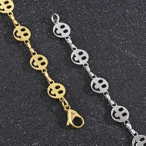 Titanium steel necklaces with hollow smiley face charms in gold and silver colors