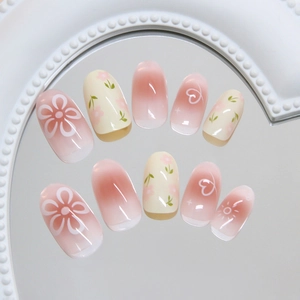 Sweet pink floral press-on nails with star patterns and cream finish, 24 piece set