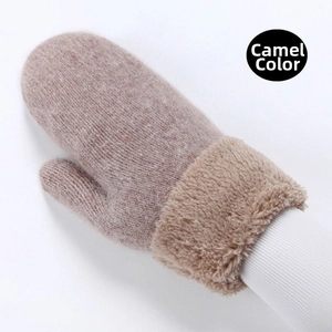 Detailed close-up of thick camel knitted mittens with warm faux fur plush cuffs