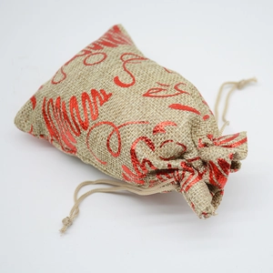 Linen advent calendar drawstring gift bag with shiny red metallic printed pattern