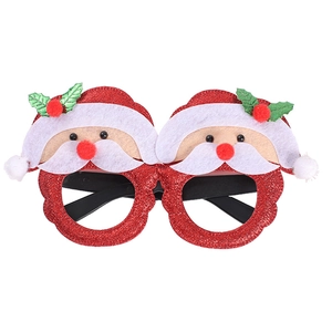 Detail of Christmas Santa Claus party glasses with red glitter frame and felt ornaments
