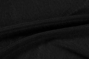 Close-up of high-density black mesh fabric texture and knit material detailing
