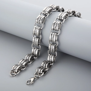 Detailed macro view of 15mm stainless steel chunky chain link with a secure lobster clasp