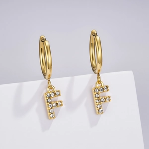 Detail of gold letter F earring with pavé rhinestones on a round clasp hanger