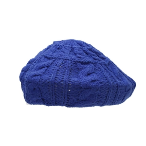 Women's royal blue cable knit beret hat with textured pattern for winter style