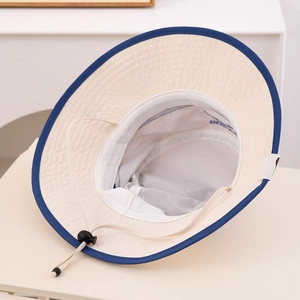 Detail of kids sun hat with breathable mesh lining and adjustable windproof drawstring