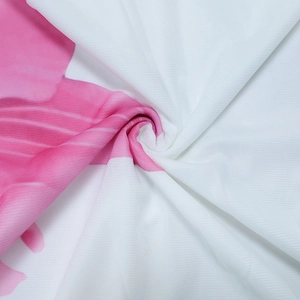 Macro detail of high-quality pink and white printed mesh fabric with soft spiral draping