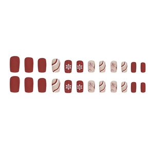 24pcs Christmas press-on nails featuring gingerbread man and snowflake designs