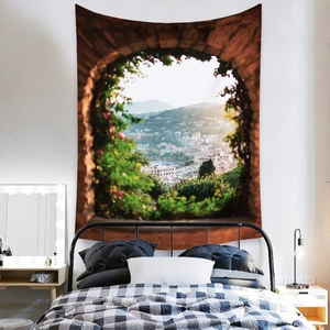 Detail of bohemian tapestry featuring a Mediterranean landscape through a stone archway