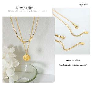 Close-up of dual-layer gold titanium steel coin necklace with K18 engraving detail