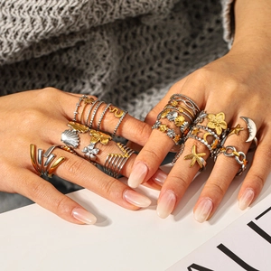 Bohemian gold and silver mixed color ring set with starfish, moon, and floral designs