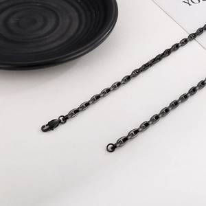 Detail of black stainless steel chain necklace with precision lobster clasp closure