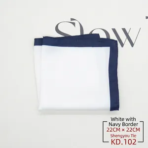 Close-up of white silk pocket square with navy blue piping and 22cm x 22cm sizing