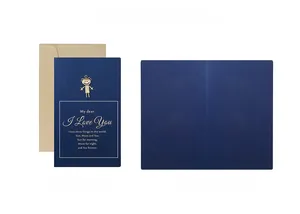 Detail of navy blue gold foil thank you card with kraft envelope and foldable inner page