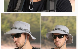 Detail of grey outdoor sun hat with wide brim, windproof drawstring and breathable vents