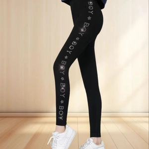 Women's black thermal leggings with side sparkling rhinestone BOY and star design