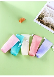 Detailed view of five colorful nylon foaming net bags with drawstring and secure locks