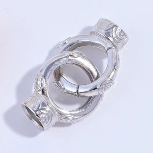 Polished silver S925 sterling silver connector clasp with intricate spiral engraving