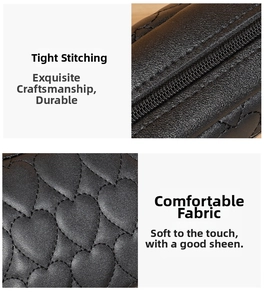 Detail of heart embroidered quilting and high-quality faux leather on the crossbody camera bag