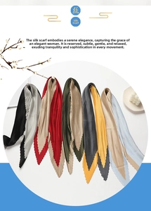 Detail of colorful pleated silk scarves showing multi-color block patterns and fine textures