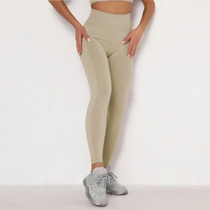 Detail view of high waist seamless yoga leggings in sage green with soft knit texture