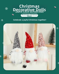 Close-up of three lighted Christmas gnomes with sequined hats and striped legs