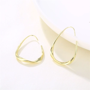 Polished gold teardrop hoop earrings with minimalist twisted geometric metal design