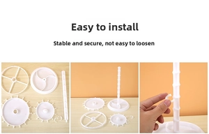 Detail of white rotating jewelry rack showing easy assembly of tiers and hooks