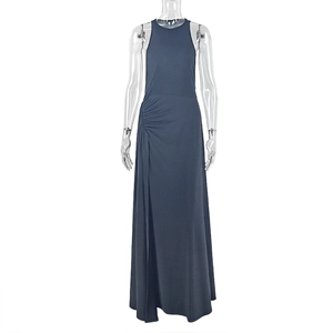 Close-up of ruched waist detail and draped texture on dark gray sleeveless maxi dress