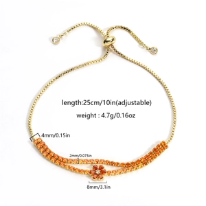 18K gold-plated adjustable bracelet featuring orange zircon floral centerpiece and draw-string