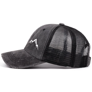 Distressed charcoal grey trucker hat with mountain embroidery and black mesh back panel