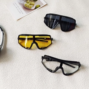 Kids sports sunglasses with black, yellow, and clear lenses for UV protection