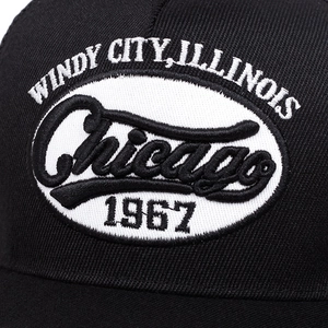 Chicago 1967 embroidery details on black mesh trucker hat with vintage American style