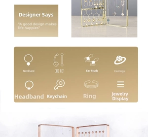 Detailed view of golden iron jewelry organizer with mesh and hooks for multi-item storage