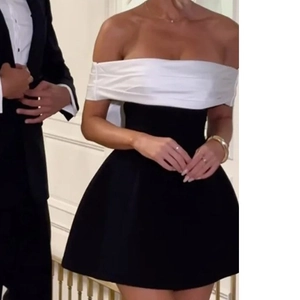 Elegant black and white contrast off-shoulder bow mini dress for formal events