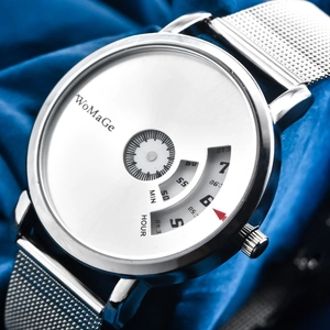 Close-up of WoMaGe watch with silver mesh strap and unique rotating disc dial on blue fabric