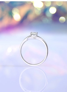 Detailed view of 0.5ct moissanite ring with S925 silver four-prong twisted setting