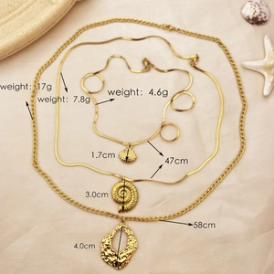 Three-piece layered gold stainless steel necklace set with sea shell and conch pendants